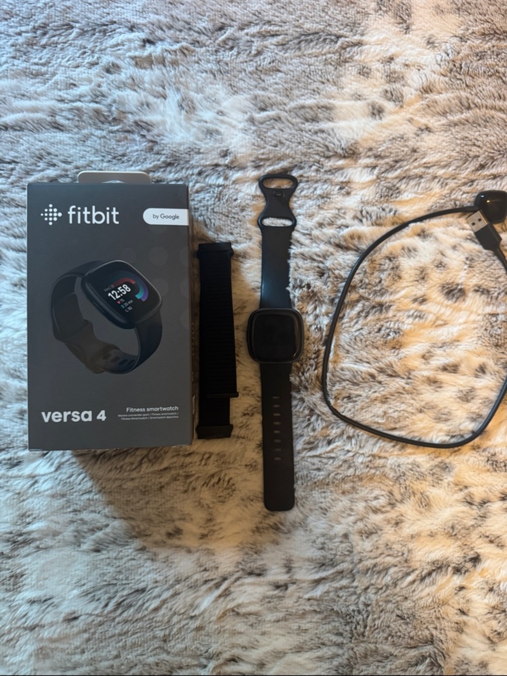 fitbit Versa 4 Smartwatch in Black with Extra Black Woven Band